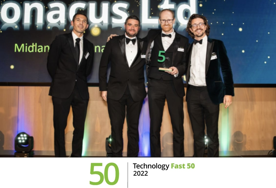 Nonacus CEO and 3 others accepting the Deloitte Tech Fast 50 award on a stage in 2022